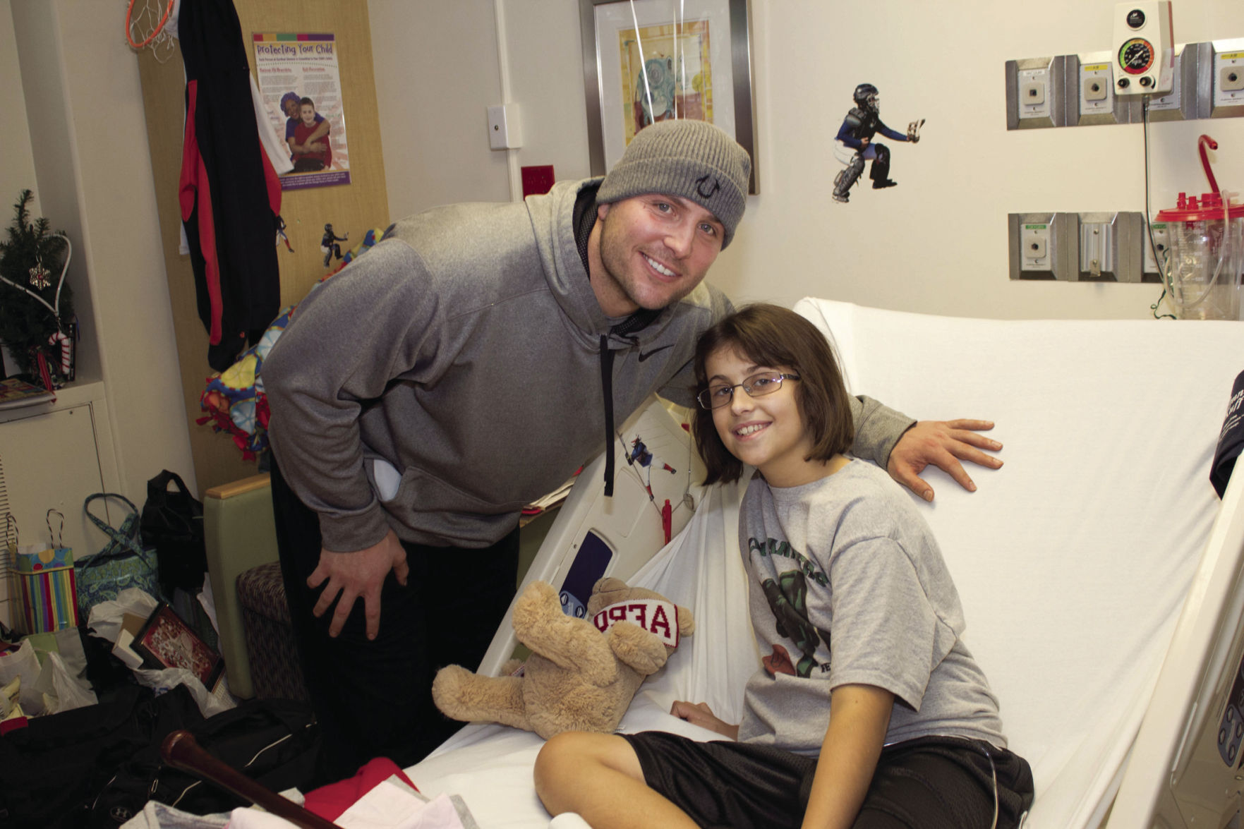STL_CardinalGlennon_couple in doc office_C_supplied.jpg